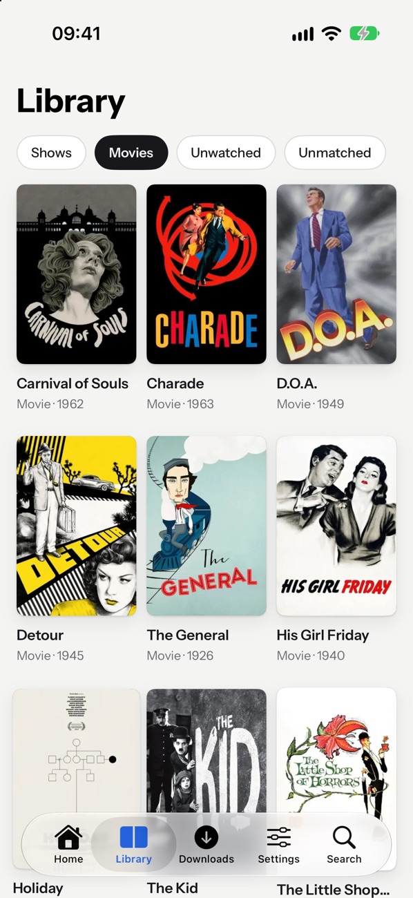Potato's Library on iPhone, filtered to Movies, with titles and years under each poster.